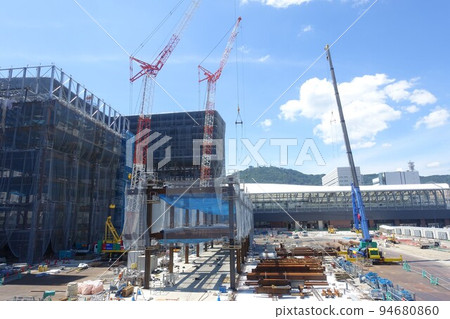 Large construction site with tower cranes Large construction site with tower cranes 94680860