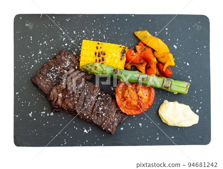 Entrana Argentinean skirt steak, grilled beef with asparagus, corn and tomato 94681242
