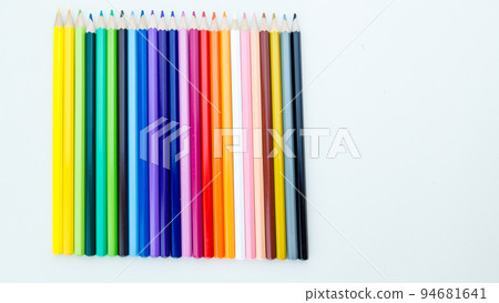 Colored pencil crayons in a row 94681641
