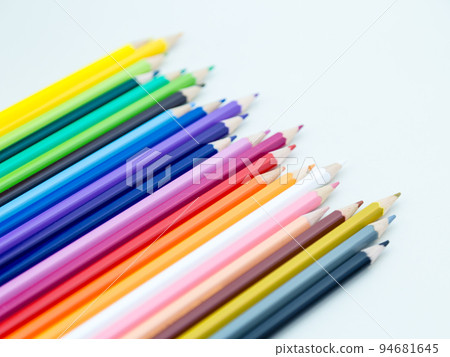 Colored pencil crayons in a row 94681645