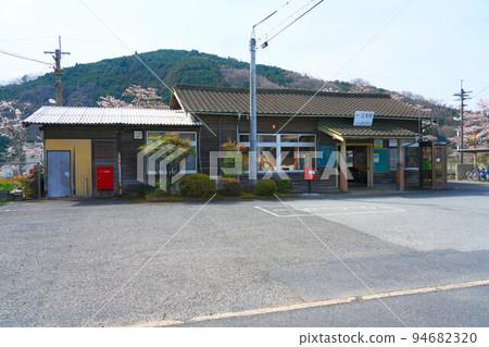 Spring scenery of the wooden station building of Mimasaka-Emi Station on the Kishin Line, Mimasaka City, Okayama Prefecture 94682320