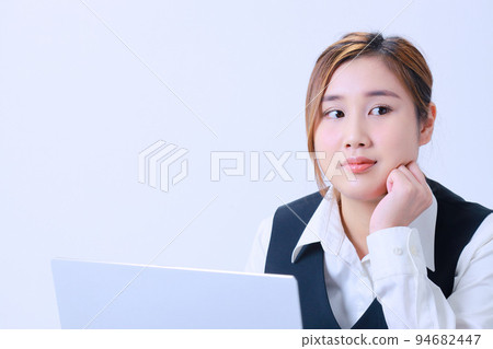 A young OL who thinks during work A young OL who thinks during work 94682447