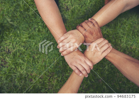 Diverse multiethnic Partners hands together teamwork group of multiracial people meeting join hands togetherness. Diversity people hands join empower partnership teams connection volunteer community 94683175