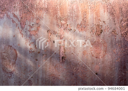 Pink cracked concrete texture background. Pink cracked concrete texture background. 94684001