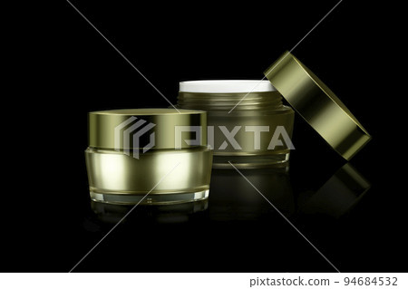 Mockup two empty luxury golden cream jar for skincare and beauty skin, isolated on black background with clipping path. Mockup two empty luxury golden cream jar for skincare and beauty skin, isolated on black background with clipping path. 94684532
