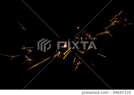 Best photo of real sparkler with sparks on black background for overlay blending mode Best photo of real sparkler with sparks on black background for overlay blending mode 94687320