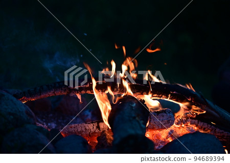 Campfire at night as a close up Campfire at night as a close up 94689394