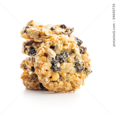 Wholegrain oat cookies. Cookies with oatmeal and raisins isolated on white table. Wholegrain oat cookies. Cookies with oatmeal and raisins isolated on white table. 94689739