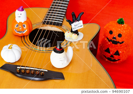 Acoustic guitar and Halloween toys Acoustic guitar and Halloween toys 94690107