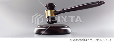 Judges wooden hammer on soundboard placed grey background 94690503