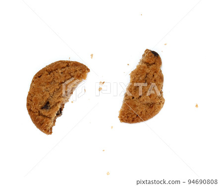 round chocolate chip cookie with crumbs isolated on white background round chocolate chip cookie with crumbs isolated on white background 94690808