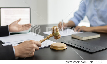 Attorney or judge provides legal advice to the client in the courtroom, Ethics in the courts include justice and impartiality, Legal consultant, Scales of justice, Law hammer, Litigation and justice. Attorney or judge provides legal advice to the client in the courtroom, Ethics in the courts include justice and impartiality, Legal consultant, Scales of justice, Law hammer, Litigation and justice. 94691179