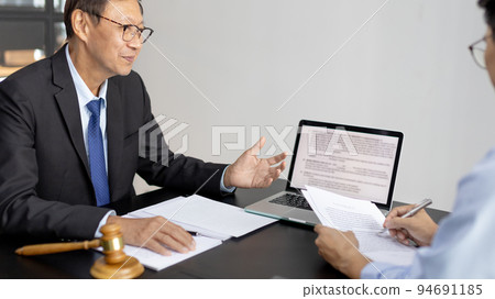 Attorney or judge provides legal advice to the client in the courtroom, Ethics in the courts include justice and impartiality, Legal consultant, Scales of justice, Law hammer, Litigation and justice. 94691185