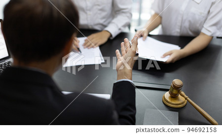 Attorney or judge provides legal advice to the client in the courtroom, Ethics in the courts include justice and impartiality, Legal consultant, Scales of justice, Law hammer, Litigation and justice. Attorney or judge provides legal advice to the client in the courtroom, Ethics in the courts include justice and impartiality, Legal consultant, Scales of justice, Law hammer, Litigation and justice. 94692158