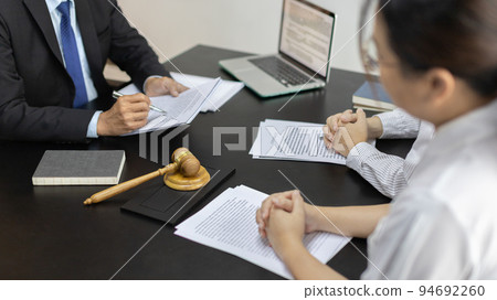 Attorney or judge provides legal advice to the client in the courtroom, Ethics in the courts include justice and impartiality, Legal consultant, Scales of justice, Law hammer, Litigation and justice. Attorney or judge provides legal advice to the client in the courtroom, Ethics in the courts include justice and impartiality, Legal consultant, Scales of justice, Law hammer, Litigation and justice. 94692260