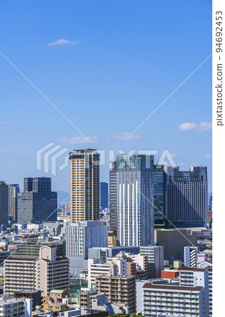 The cityscape of Osaka seen from the Tsutenkaku observatory toward Namba [2022-early autumn] 94692453