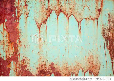 Red rust texture on a blue background 94692904