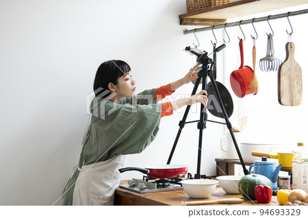 Young woman preparing for cooking livestream 94693329