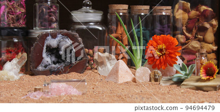 Chakra Stones With Aloe Vera and Incense Cones on Australian Red Sand Chakra Stones With Aloe Vera and Incense Cones on Australian Red Sand 94694479