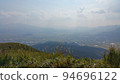 Scenery from Aso Daikanmine with swaying pampas grass 94696122