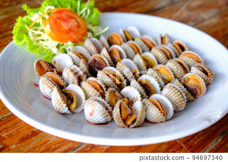 Boiled ark shell seafood serve in Thailand restaurant Boiled ark shell seafood serve in Thailand restaurant 94697340