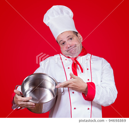 Chief cook showing empty pot Chief cook showing empty pot 94698869