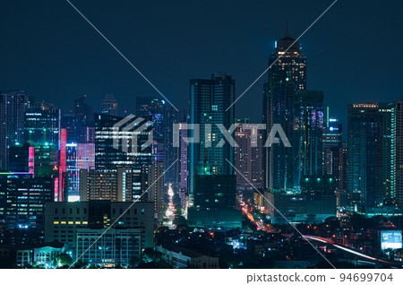 Night view of skyscrapers in Manila, Philippines Night view of skyscrapers in Manila, Philippines 94699704