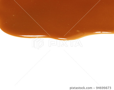 sauce caramel sweet isolated on white background sauce caramel sweet isolated on white background 94699873