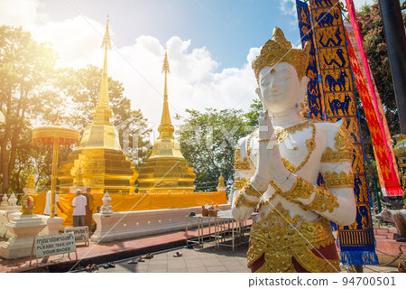Wat Phra That Doi Tung an iconic two golden pagoda on Doi Tung mountain in Chiang Rai province of Thailand. Wat Phra That Doi Tung an iconic two golden pagoda on Doi Tung mountain in Chiang Rai province of Thailand. 94700501