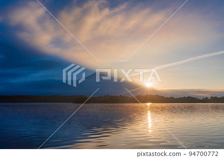 (Shizuoka Prefecture) Sunrise from the mountainside of Mt. Fuji seen from Lake Tanuki (Shadow Fuji) (Shizuoka Prefecture) Sunrise from the mountainside of Mt. Fuji seen from Lake Tanuki (Shadow Fuji) 94700772