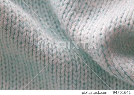 Warm gray sweater material, background, macro. Comfort 94701641