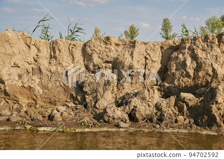 River bank erosion in a turn 94702592