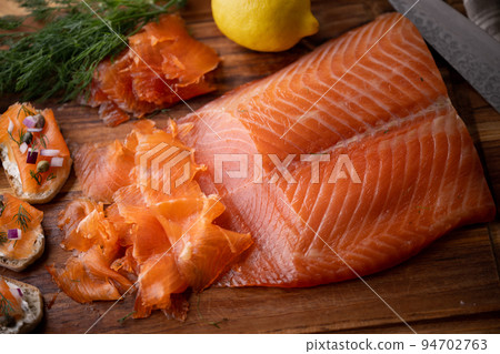 glavlax, scandinavian cured salmon fillet glavlax, scandinavian cured salmon fillet 94702763