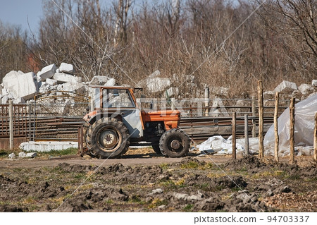 Tractor in the backyard 94703337