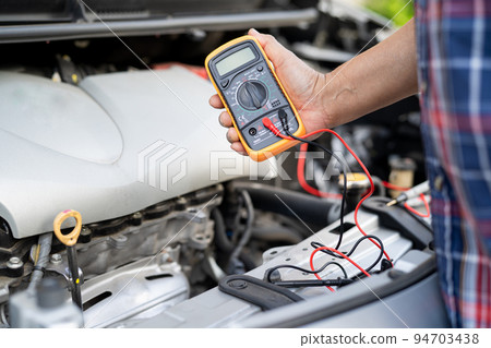 Open hood mechanic engine system to check and repair damage car crash. Open hood mechanic engine system to check and repair damage car crash. 94703438