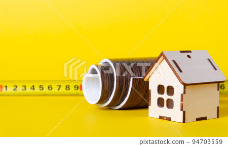 Floor coverings in a wooden house. Linoleum and a small house. 94703559