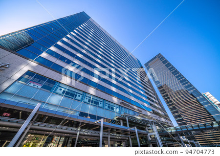 Tokyo cityscape in Japan September. Overlooking Shinagawa Station and office buildings = September 26 94704773