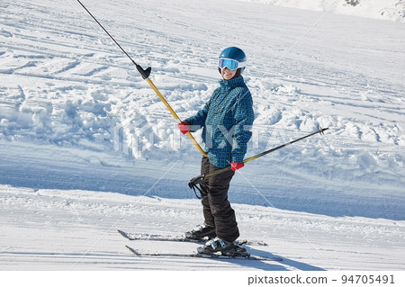 Skiing in the Alps, using ski lit 94705491