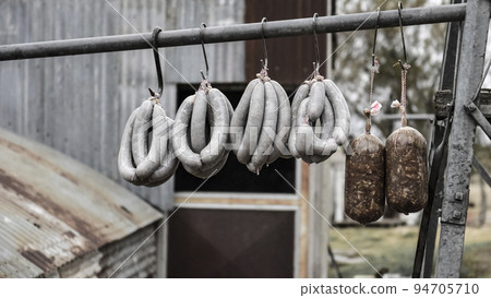 Handmade pork sausages, hung drying in fresh air Handmade pork sausages, hung drying in fresh air 94705710