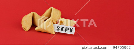 Chinese fortune cookies. Cookies with prediction words inside with currency symbol dollar, euro, ruble, and yuan. Isolated on red background 94705962