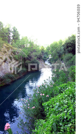 Beautiful unique landscape, mountain river, bay waterfall among the rocks, natural pools, SPA, Ontinyent, Spain Beautiful unique landscape, mountain river, bay waterfall among the rocks, natural pools, SPA, Ontinyent, Spain 94706889