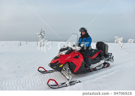 Snow mobile trip in Lapland 94706928