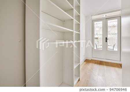 A cozy and spacious empty room in a luxury house 94706946