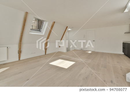Interior of empty white kitchen with windows and wooden parquet floor 94708077