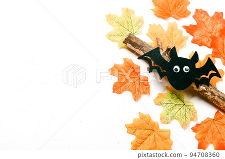 Autumn background. Autumn leaves and bat. Happy Halloween Autumn background. Autumn leaves and bat. Happy Halloween 94708360