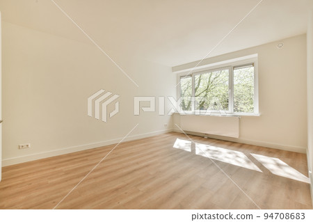 Interior of empty white kitchen with windows and wooden parquet floor Interior of empty white kitchen with windows and wooden parquet floor 94708683