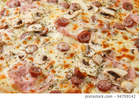 Pizza background - macro shot of italian pizza. 94709142