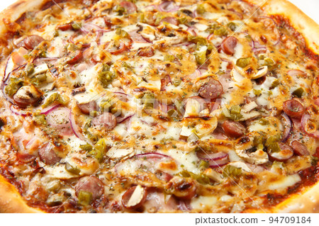 Pizza background - macro shot of spicy italian pizza. Pizza background - macro shot of spicy italian pizza. 94709184