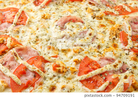 Pizza background - macro shot of italian pizza. 94709191