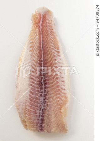Fresh fish fillet. Top view Pangasius fish fillet isolated on white background. 94709874